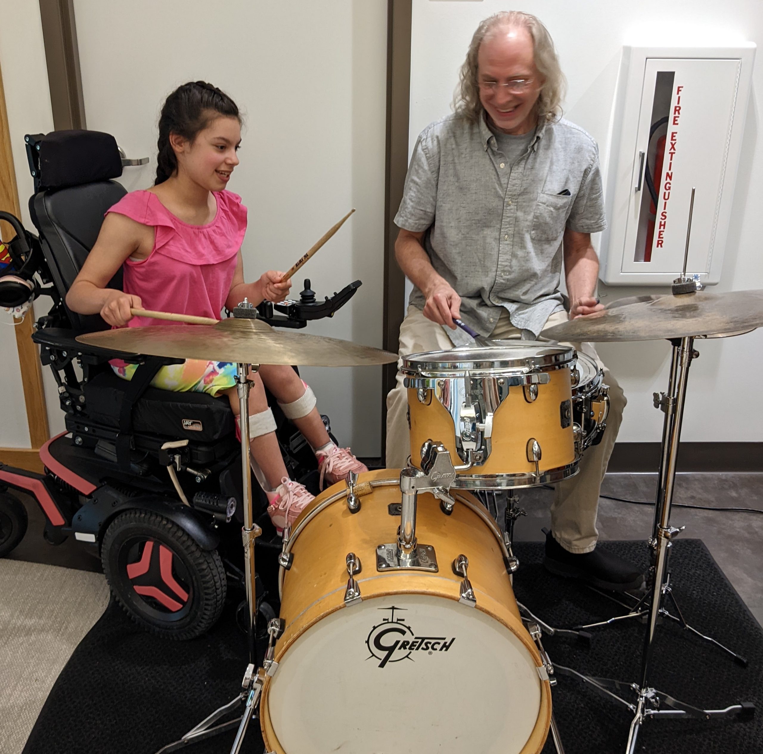 ECYS client playing drums